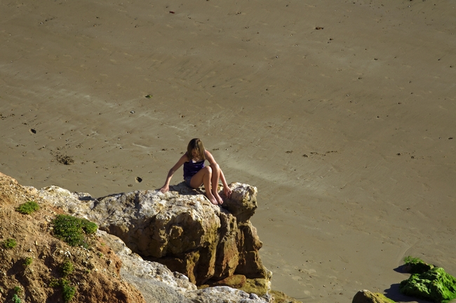 Girl On The Rocks, Compton Bay by Rod Johnson