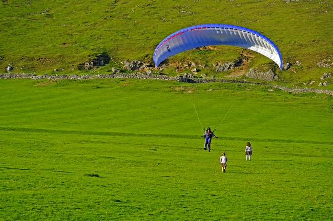 Paraglider Landing Near Ilam by Rod Johnson