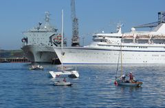 View of a cruise ship and a Royal Navy ship in the docks at Falmouth, Cornwall. Link to Boats & Ships Gallery